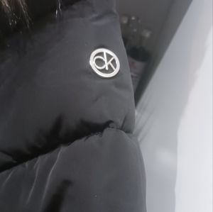 Beautiful furry Hood Calvin Klein winter coat women's size large.